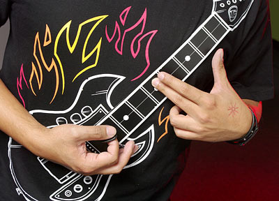 Thinkgeek electronic store guitar shirt